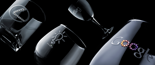 A set of glassware items with matching diamond cut decoration, featuring both the frosted etched areas and embedded crystals.